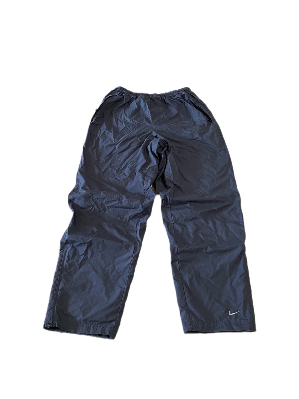 Y2K Vintage Nike Tac Silver track pants, light gray nylon, with cotton lining.